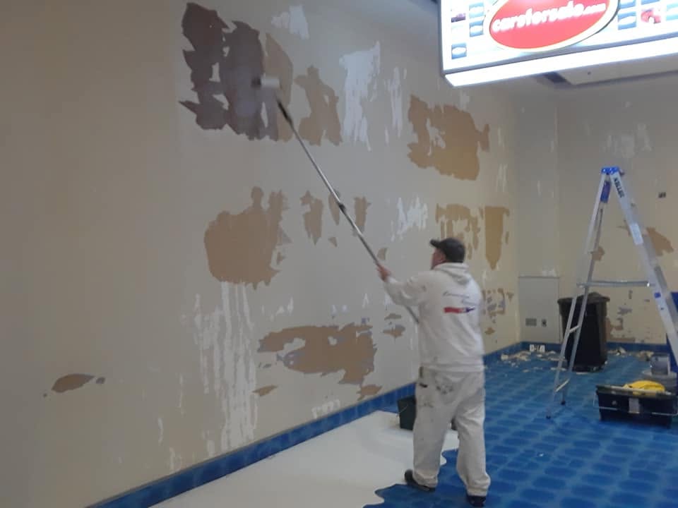 Rolling out a repaired wall at the Premier Center.